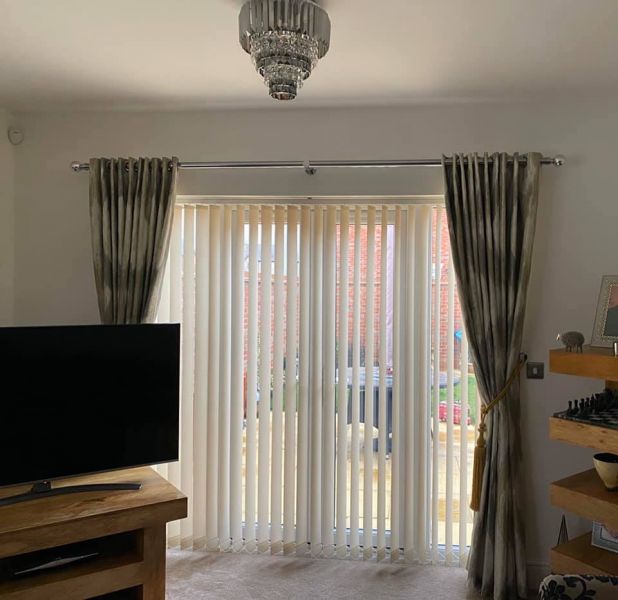 Vertical Blinds supplied and installed in Hinckley to this patio door, providing protection form the sun and allowing the light to be controlled via the tilting vanes.

Perfect for large openings such as patio doors, French doors, bi-folds and conservatories.: Swipe To View More Images