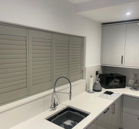 Fantastic install recently of our hardwood shutters to this lovely Kitchen, 
Supplied in Grey, 63mm Louvre with our hidden tilt system.: Click Here To View Larger Image